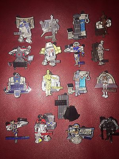 The opening bid price for this complete set of 17 mystery droid pins is  $499.99. Click photo for Ebay auction.