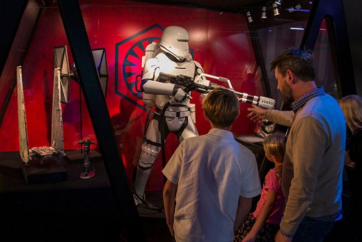 A First Order Flamethrower Stormtrooper  and his plasma rifle (a/k/a flame thrower) await your inspection at the Star Wars Launch Bay. (Photo credit: Disney)